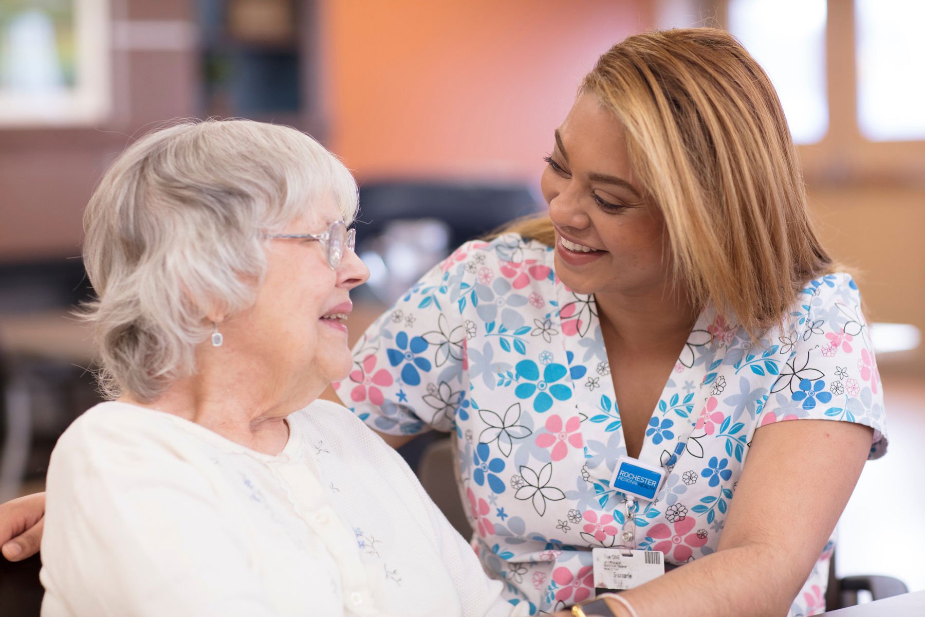 patient talking to employee