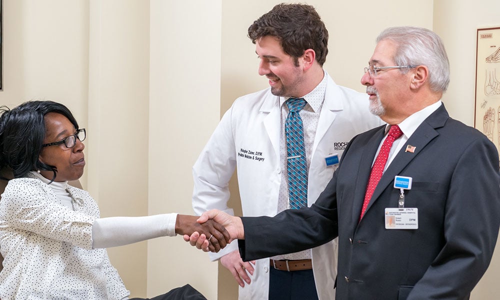 fellows interacting with patient