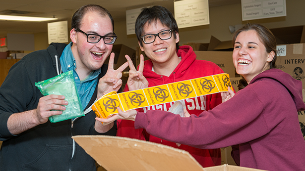 volunteers sorting medical supplies