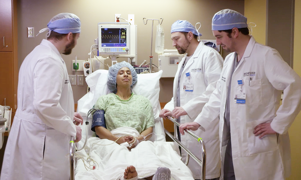 Residents talking to patient