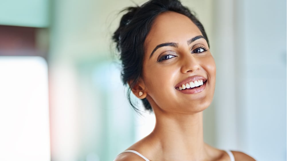 female smiling brightly 