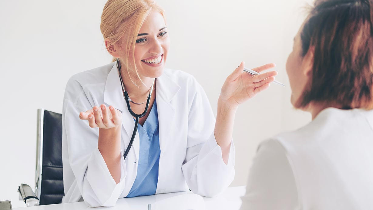 female talking with her doctor during an appointment