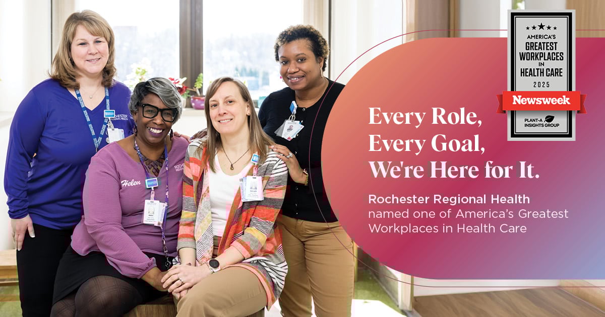 Group of health care professionals smiling at camera with newsweek recognition graphic