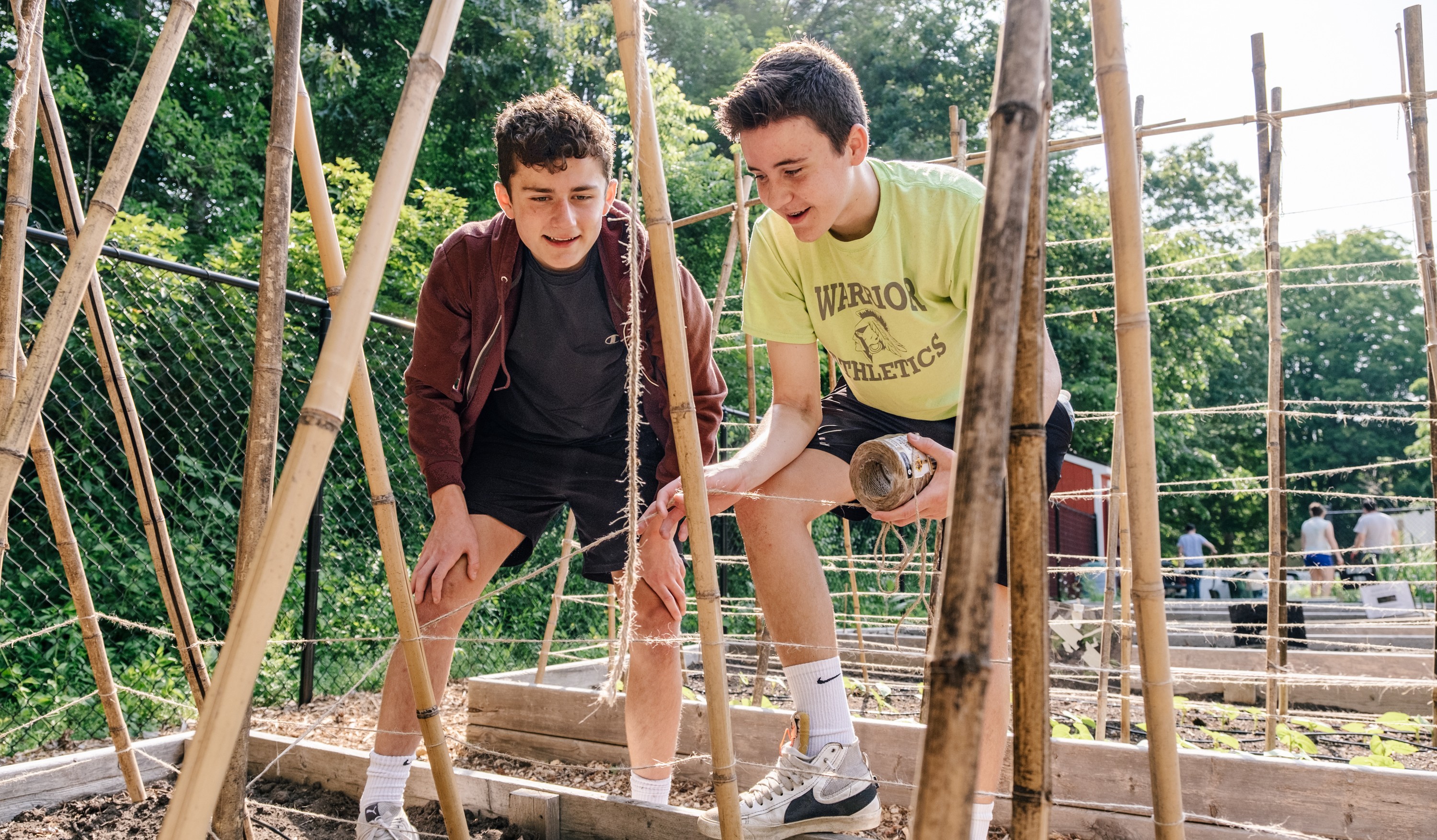 Members of the Rotary Community Corps of Sturbridge working at the Community Food Collaborative's organic garden. Sturbridge, Massachusetts, USA. 11 June 2023.