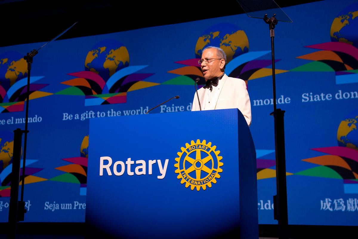 K.R. Ravindran, 2015-16 Rotary International president, presents his theme, Be a Gift to the World, at the 2015 International Assembly. 