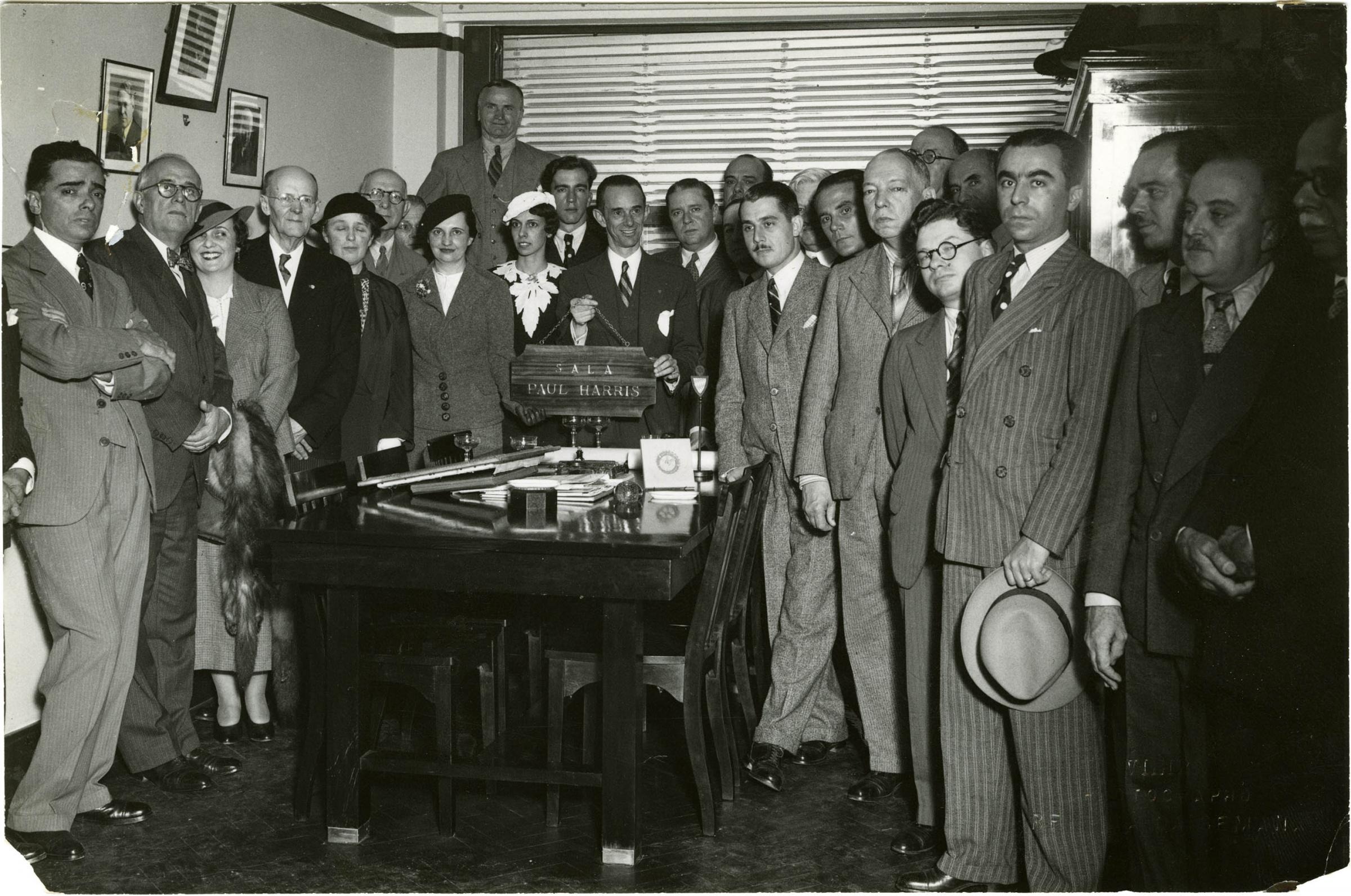 Paul and Jean Harris (third and fourth from left) in the Paul Harris Room at the Rotary Club of Rio de Janeiro, Brazil. 1936.