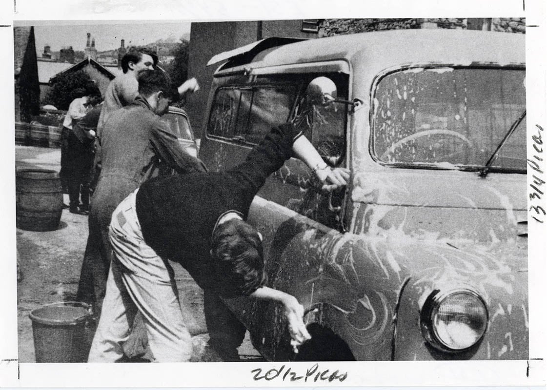 Interact members in Ulverston, Cumbria, England, hold a car wash to raise money for a public swimming pool. 1964.