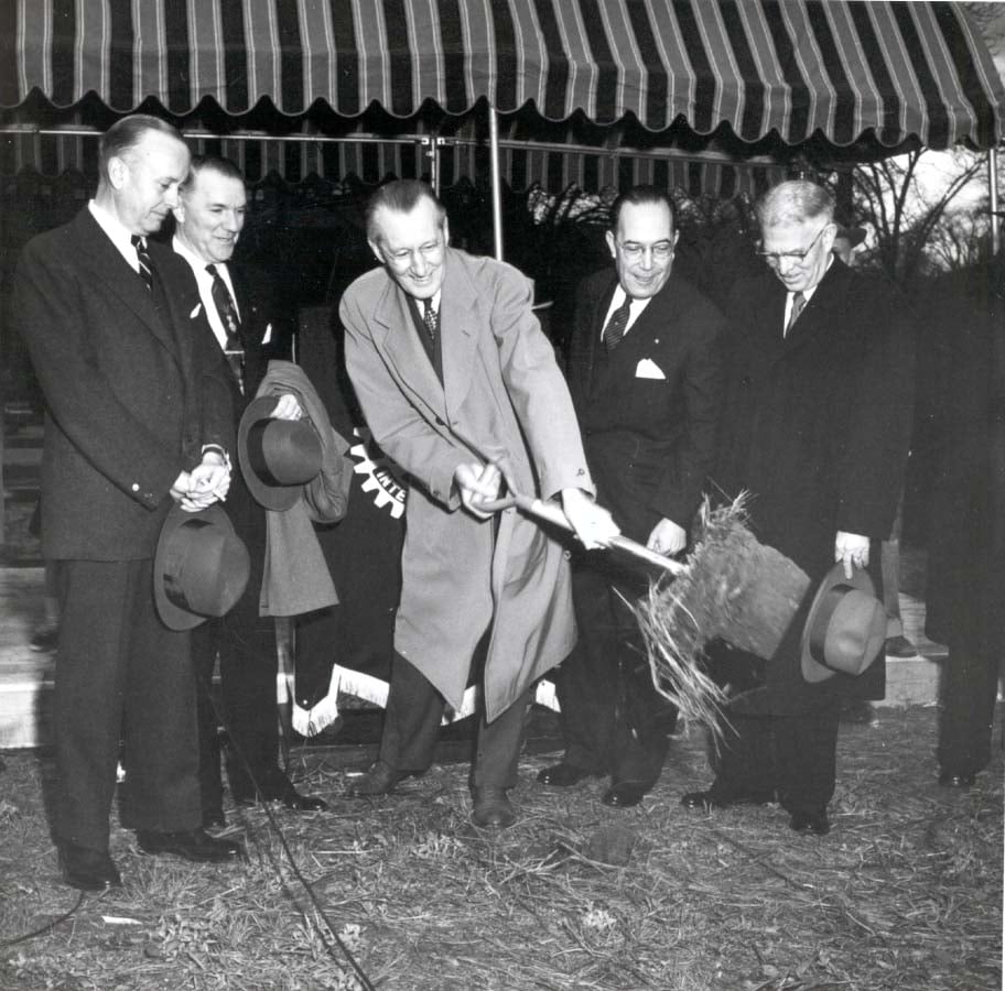 A.Z. Baker (center), who would serve as 1955-56 RI president, breaks ground for Rotary International World Headquarters on Ridge Avenue in Evanston, Illinois, USA, in May 1953. Headquarters remained here until 1987, when it moved to Sherman Avenue in Evanston.