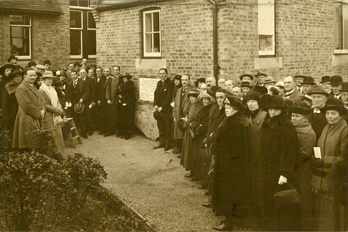 Members, spouses, and friends of the Rotary Club of Margate, Kent, England, at the dedication of an X-ray annex that they helped fund for a local hospital in 1923.