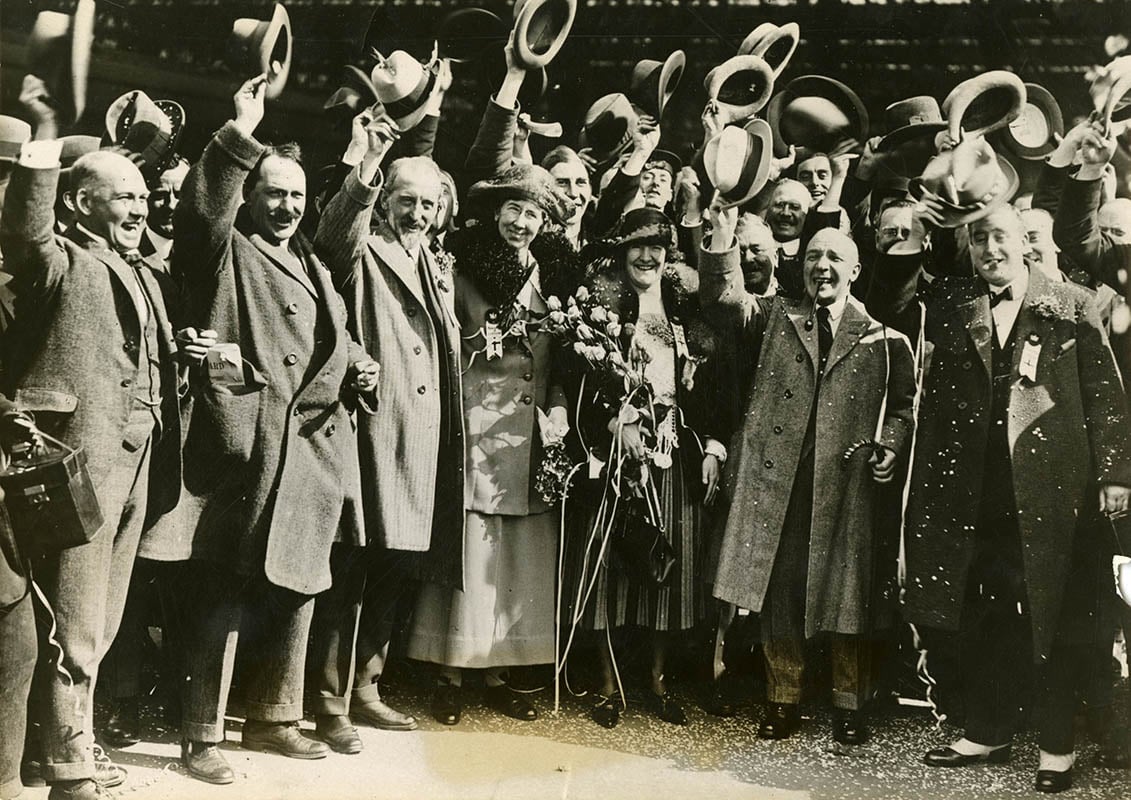 Members of the Rotary Club of London, Greater London, England — with family, friends, and entertainer Harry Lauder of the Rotary Club of Glasgow, Strathclyde, Scotland (front row, second from right) — gathered in London before traveling to the 1922 Rotary International Convention in Los Angeles, California, USA.