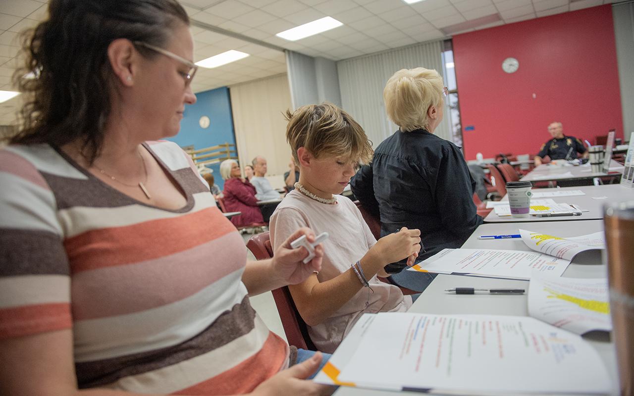 Samantha Appleton (left) and her son attend the training session, held at a YMCA in Riverview, Michigan, in October.