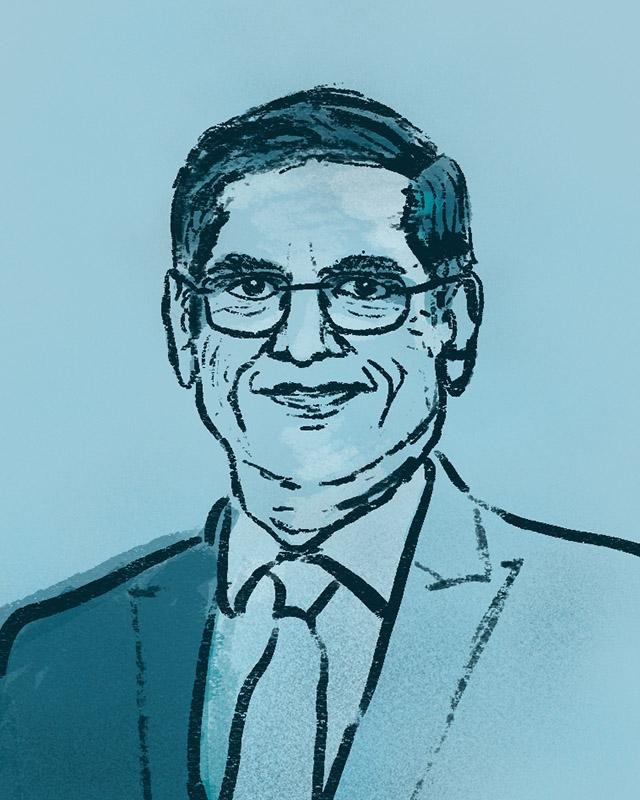 Illustration of Ambalavanan Muruganathan wearing glasses, a suit, and a tie against a blue background.