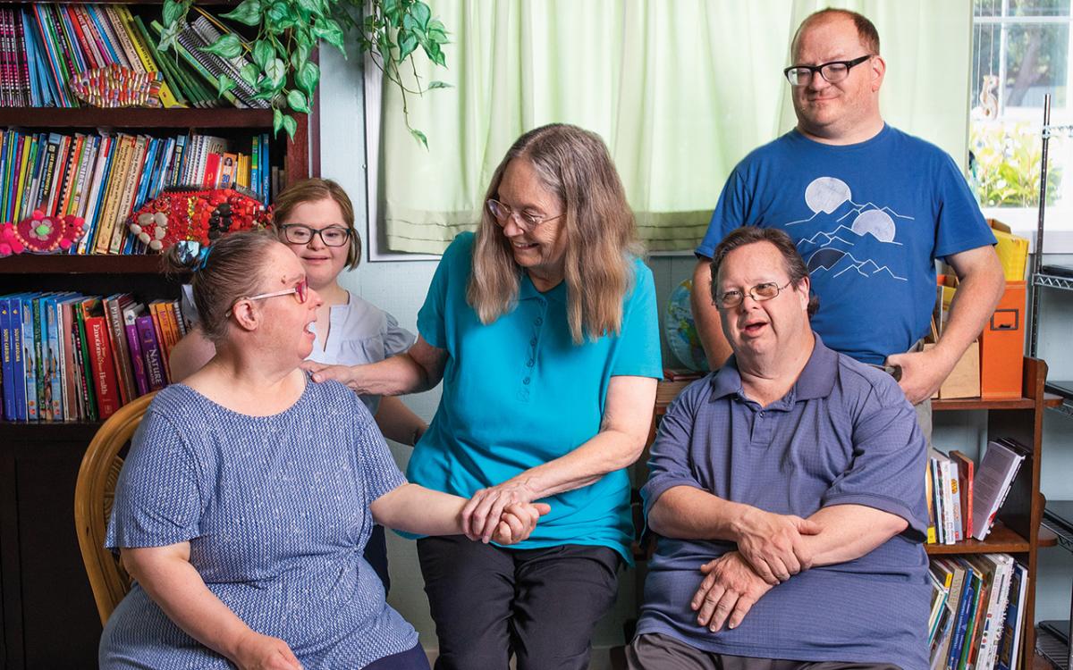 Mary Hager visits with members Ginger Sullivan, Megan Marrero, Jeremy Williams, and Nathan Hitz.