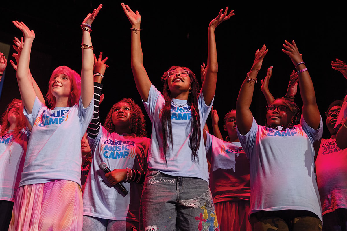 Campers come together onstage for a rollicking medley of popular hits of the past.
