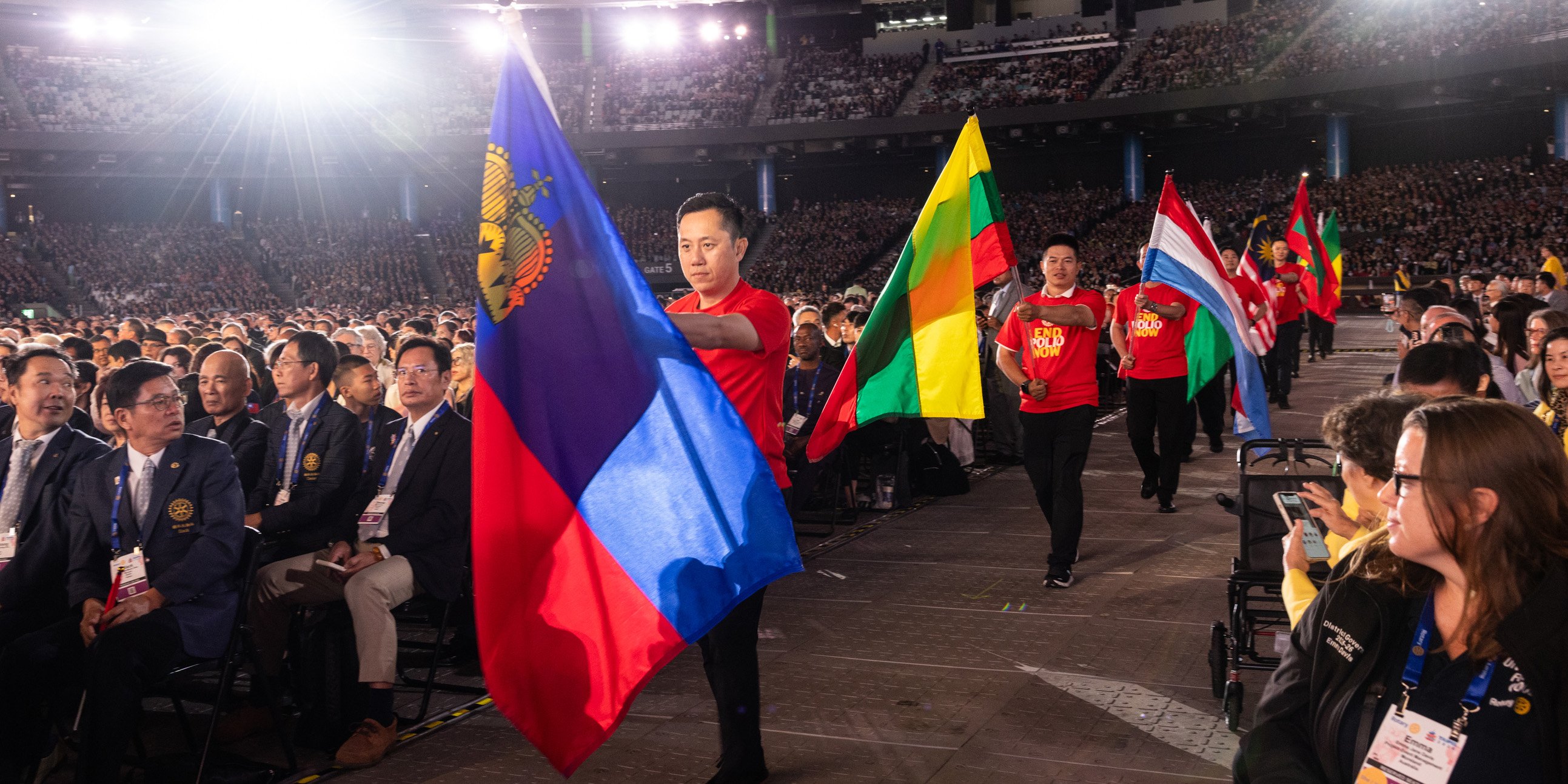 Members from Taiwan participate in the flag ceremony during the opening general session