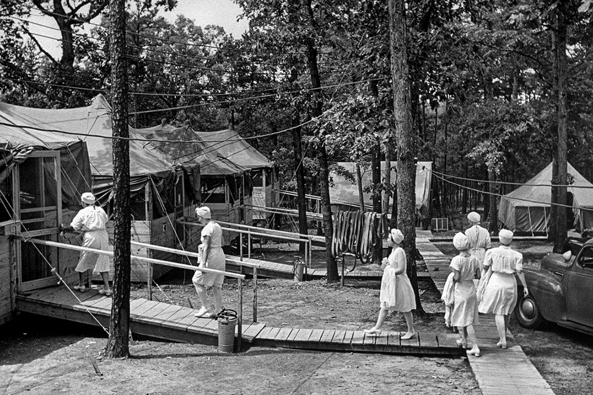 Nurses walking the grounds of a polio hospital