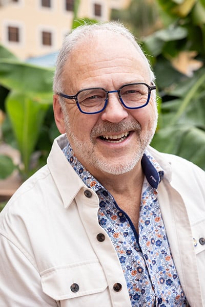 Headshot of Rotarian and retired optician Serge Poulin