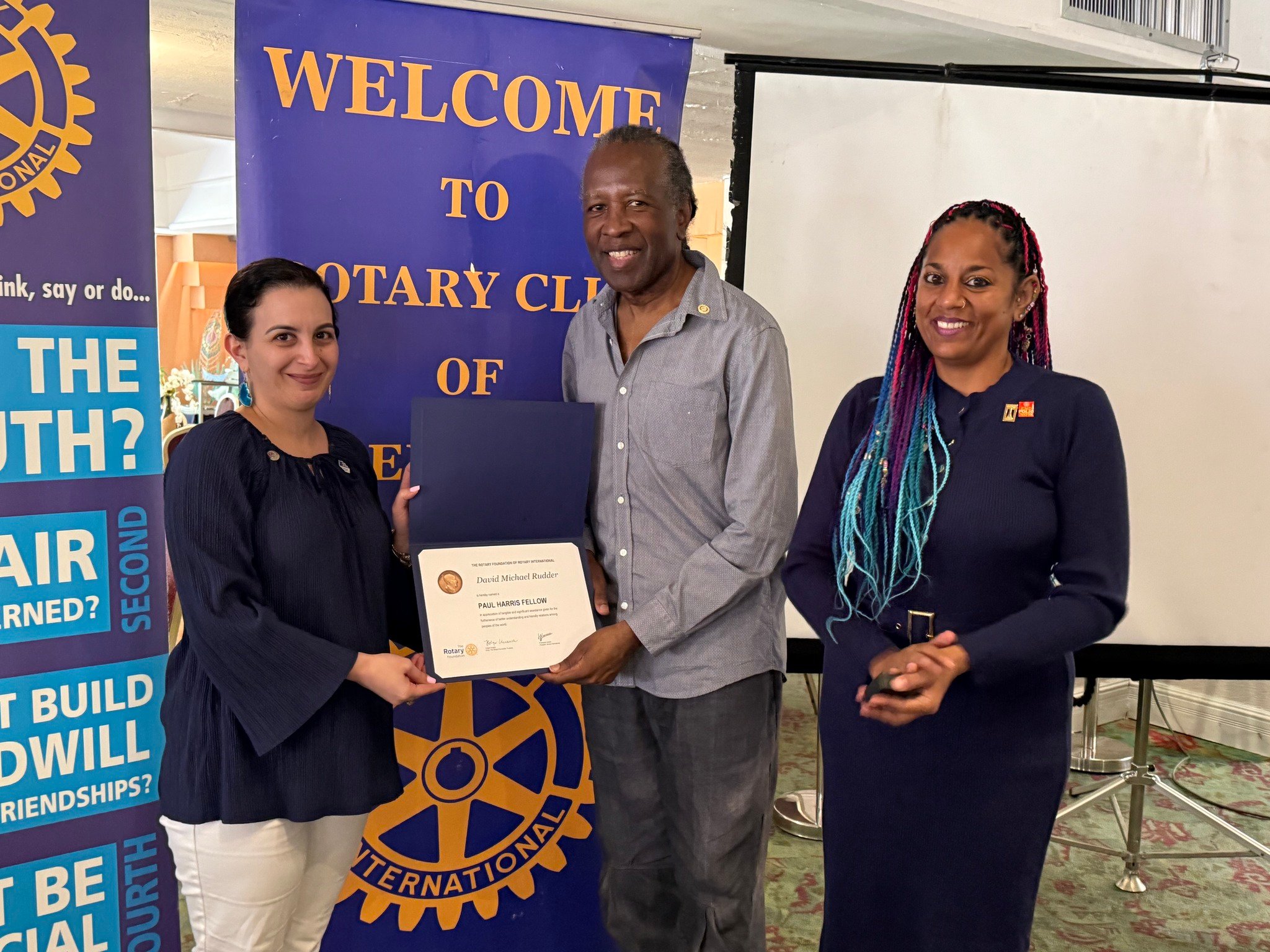 In February, the Rotary Club of Central Port of Spain honored legendary calypso artist David Rudder as a Paul Harris Fellow.