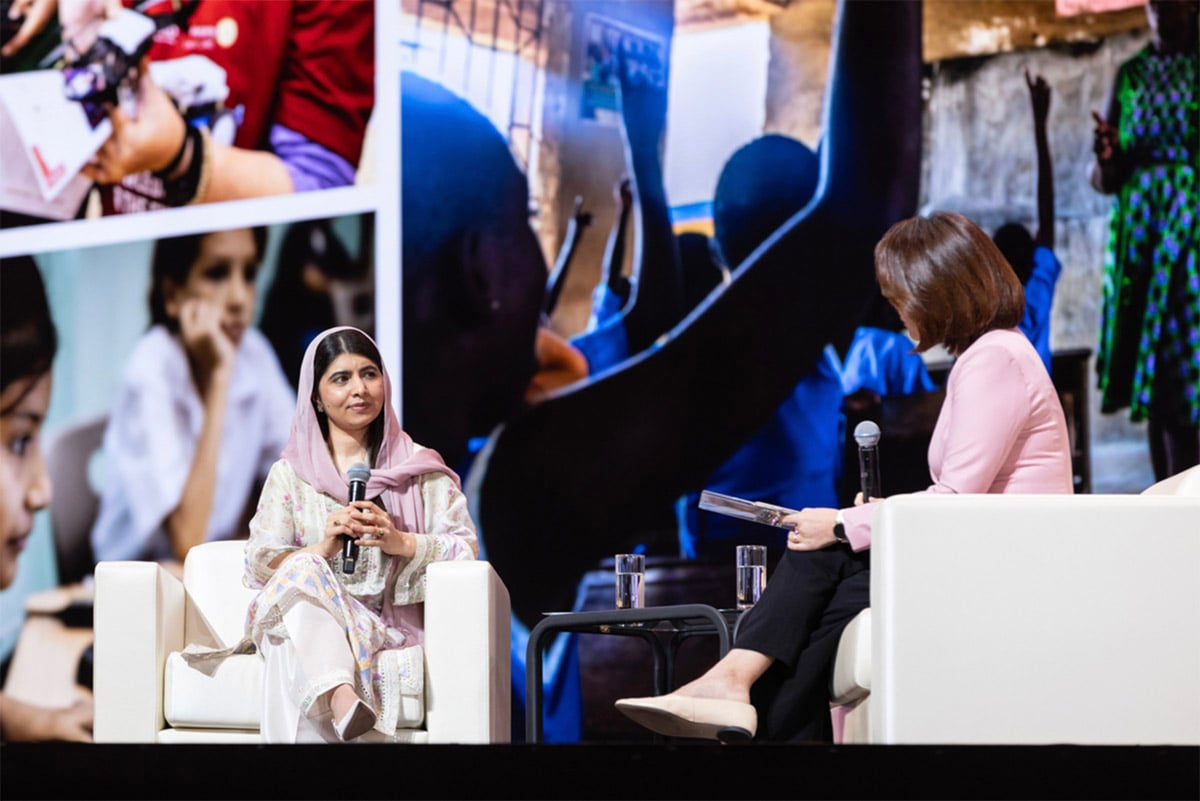 Malala Yousafzai and Yin Khvat speak on stage at the Rotary International Convention in Taipei.