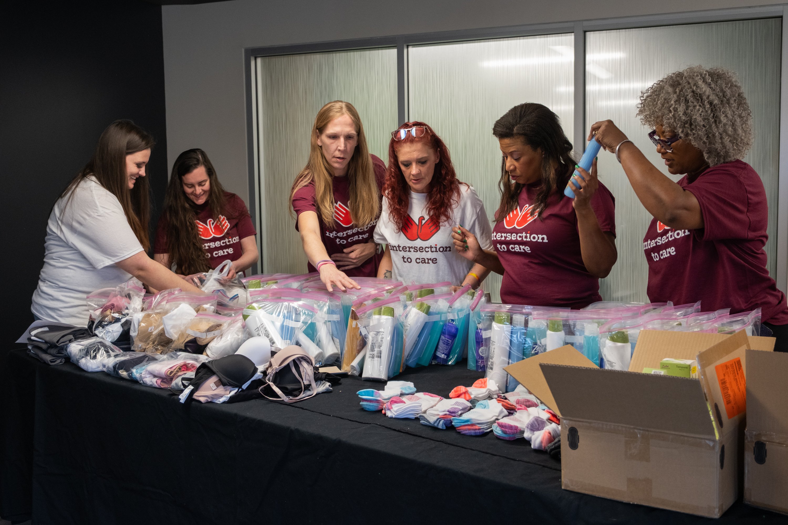 Rotary members pack care kits for incarcerated women.