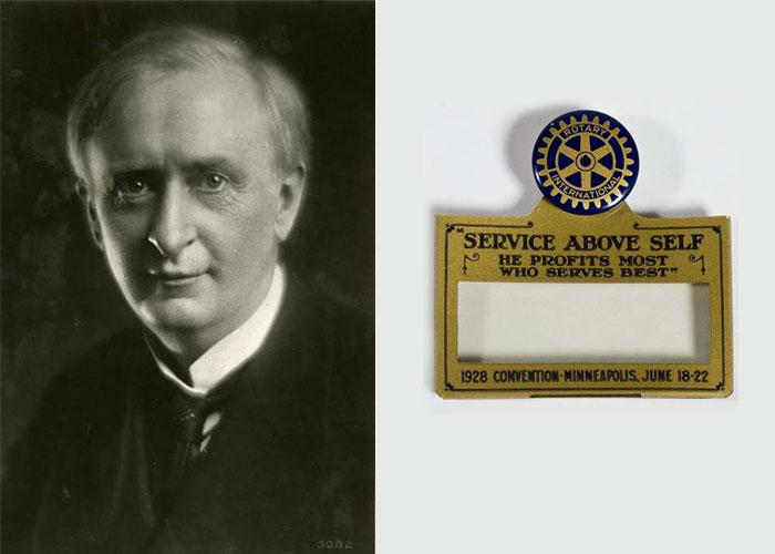 Portrait photograph beside a plaque reading “Service Above Self” on a light background.