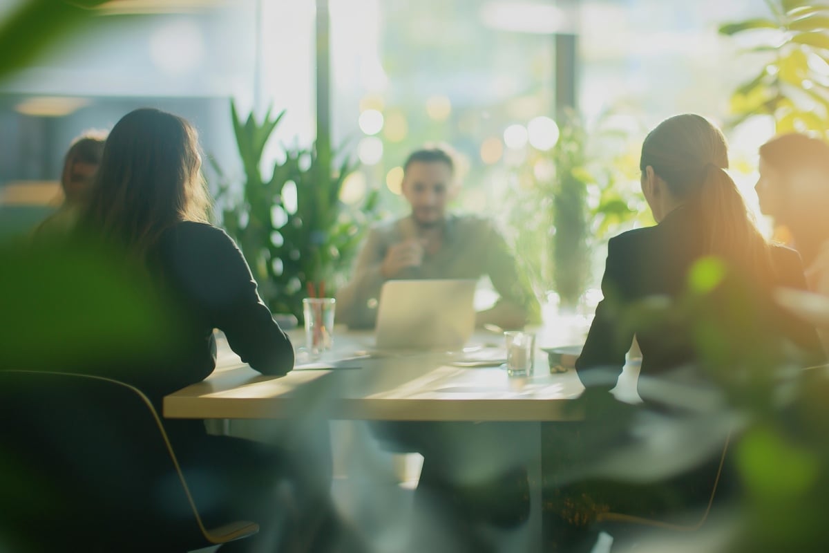 AdobeStock_1009450664_Team of business professionals having a productive meeting 1200x800