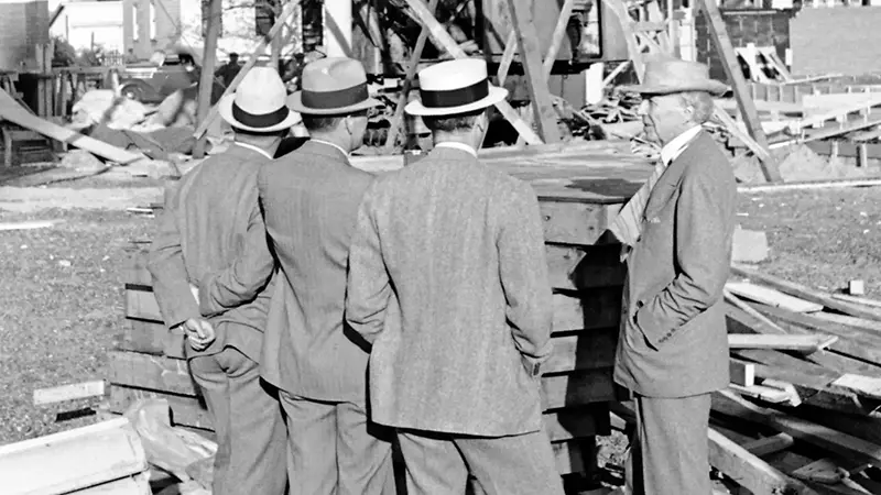 Wright testing the stability of one of his dendriform columns