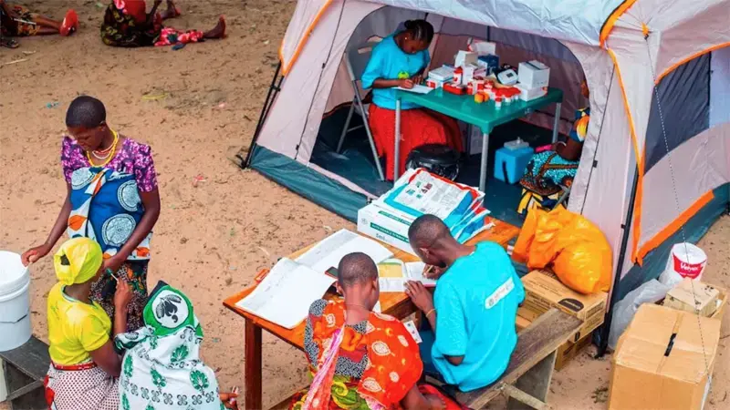 People visiting health clinics build by the community.