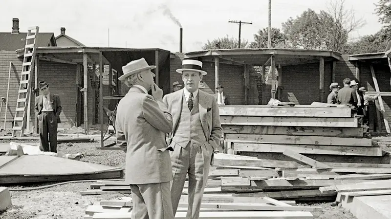 H.F. Johnson, Jr. and Frank Lloyd Wright, at the Administration Building construction site, 1937