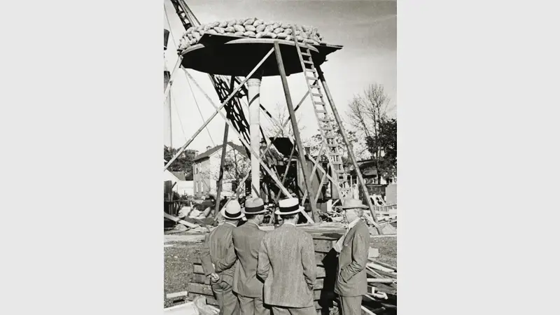 H.F. Johnson, Jr. and Frank Lloyd Wright, at the Administration Building construction site, 1937