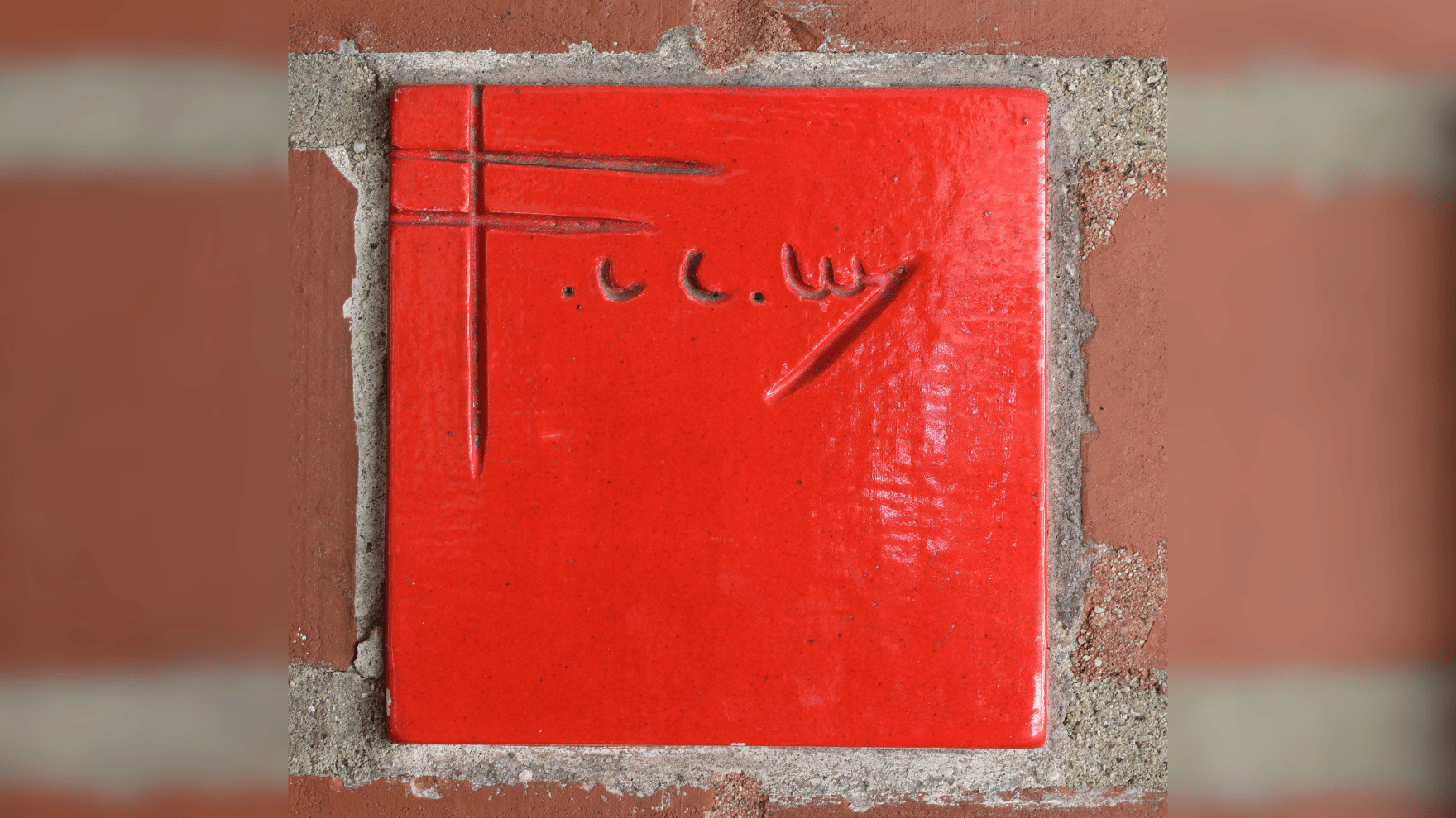 Frank Llyod Wright signature red tile.