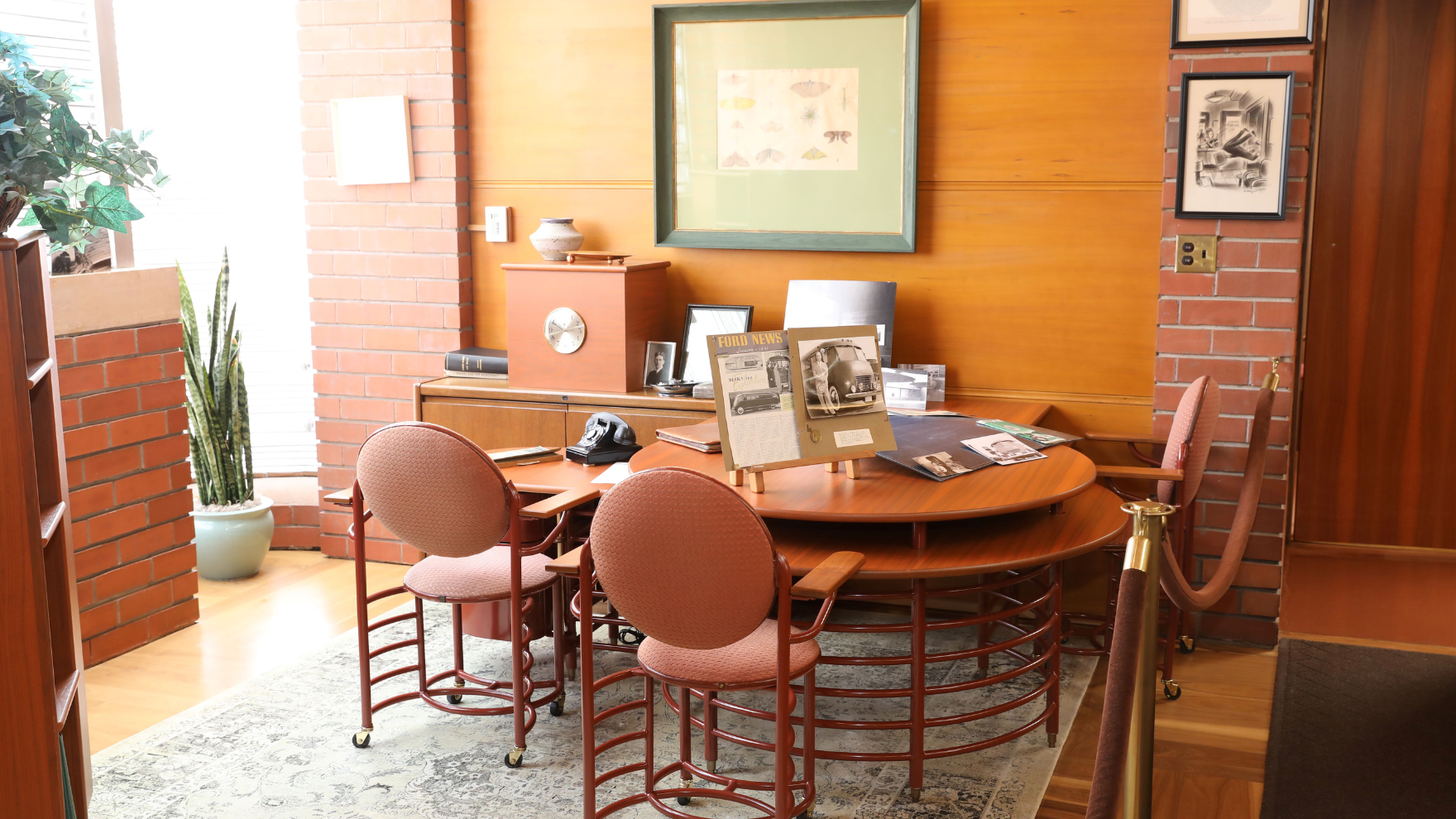 Office room with chairs and other furniture designed by Frank Lloyd Wright