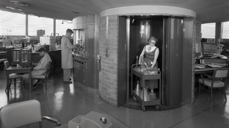 Woman getting off an elevator