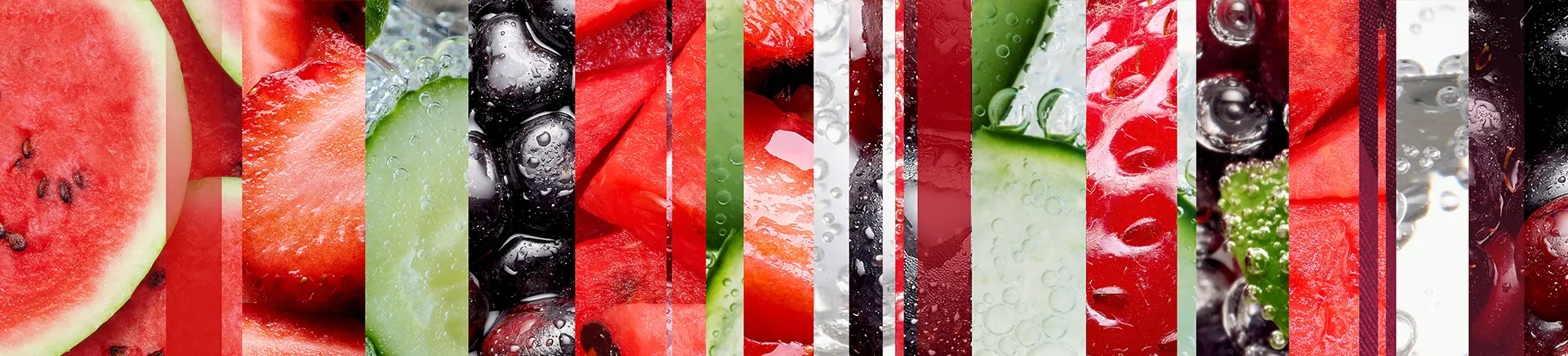Slices of various fruits and vegetables, including watermelon, cucumber, strawberries, and berries, arranged vertically with water droplets over them, creating a colorful, refreshing mosaic effect.