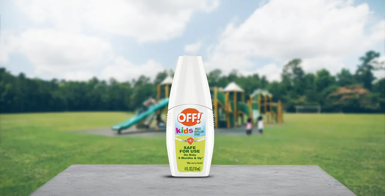 Front of an OFF! Kids bottle with a playground in the background