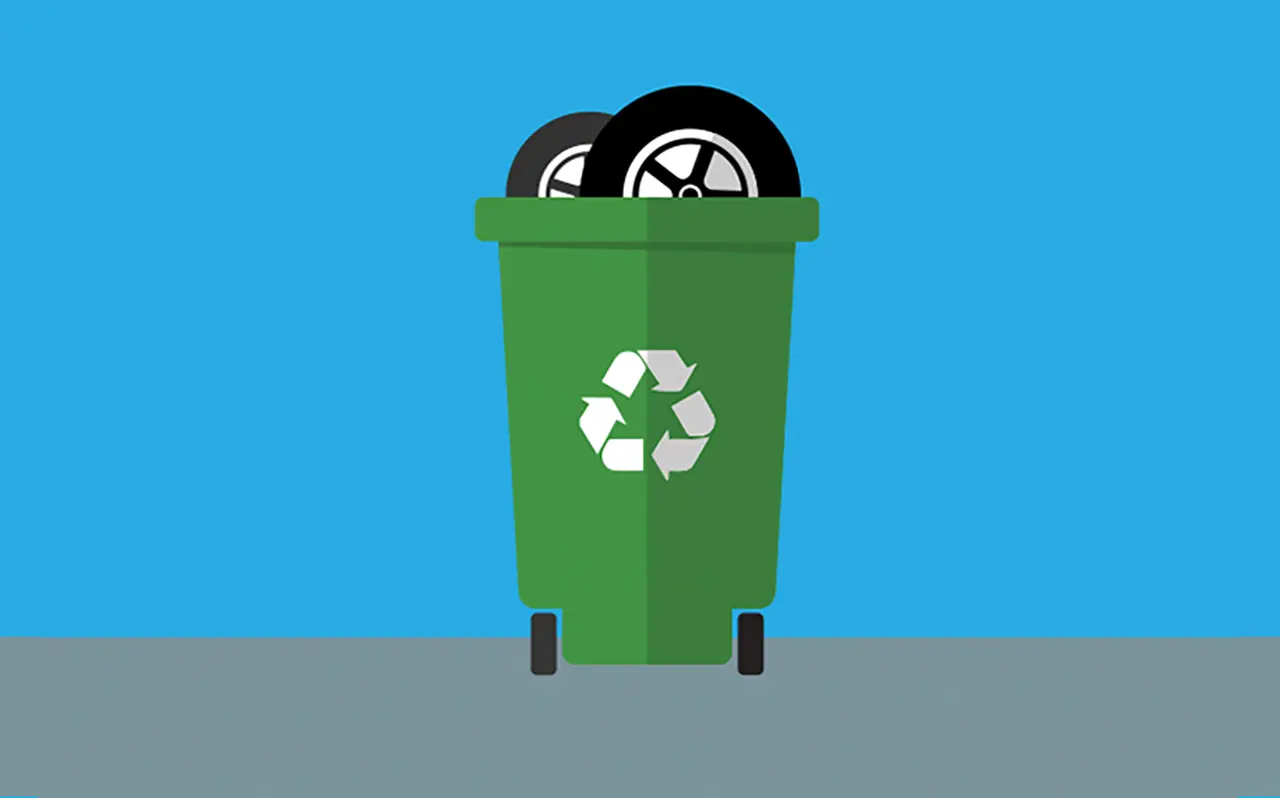Illustrated image of tires inside a green recycling bin