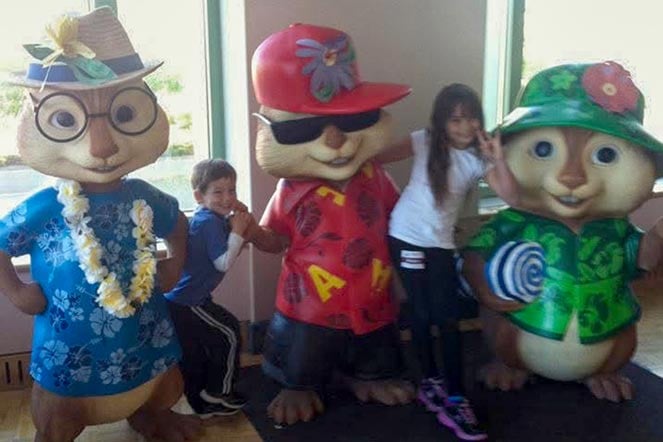 female scoliosis patient, young boy, cartoon mascots