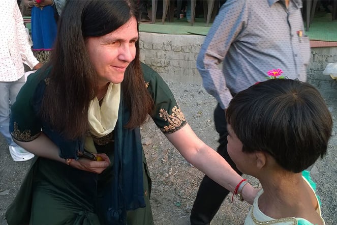 an adult speaking to a child