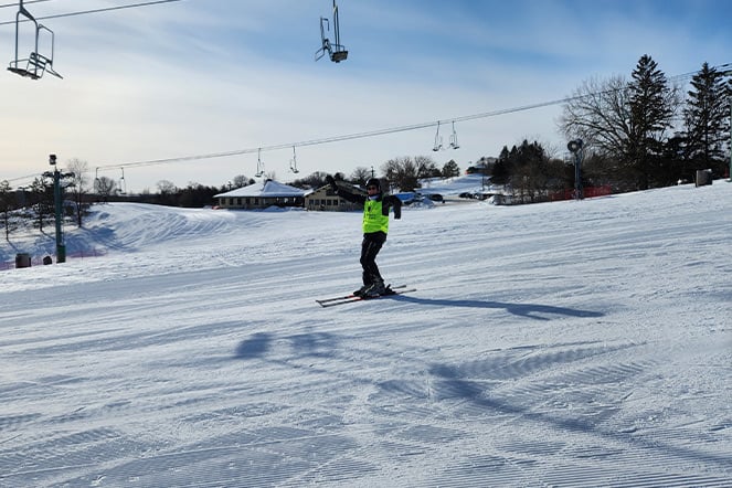 a skiier on a ski slope