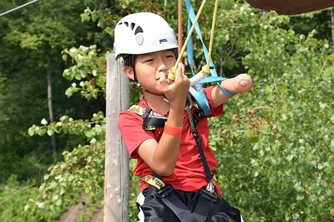 a child on a zipline
