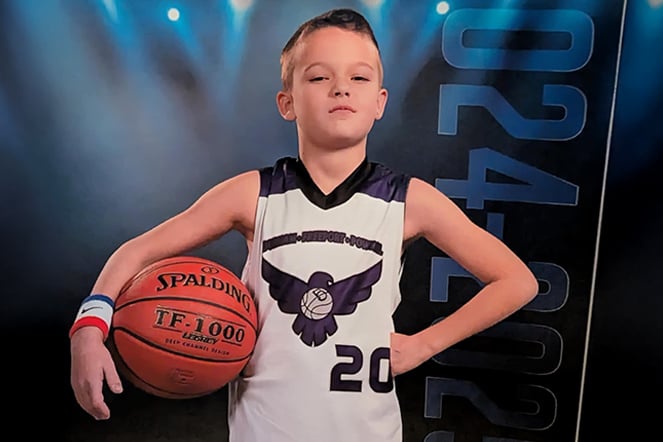 a portrait of a young basketball player