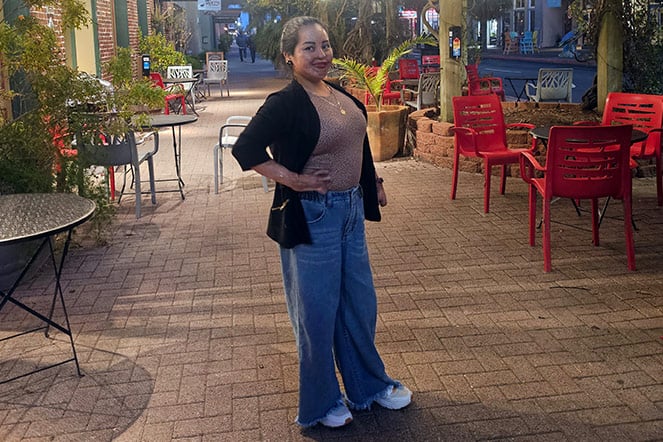 a teenager in a patio area