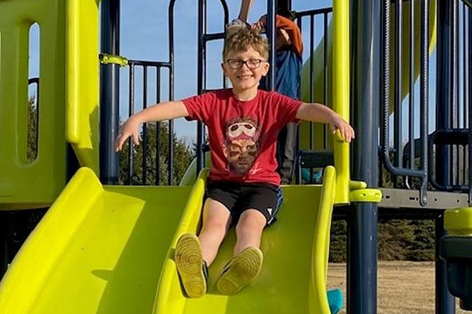 a child going down a slide