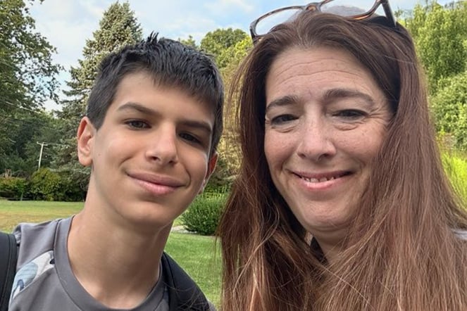 a selfie photo of a mom and son