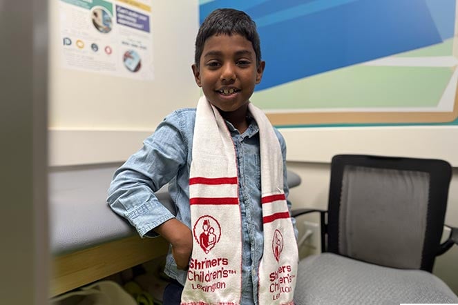 prosthetics patient wearing scarf