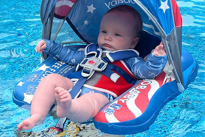 an infant in a pool float