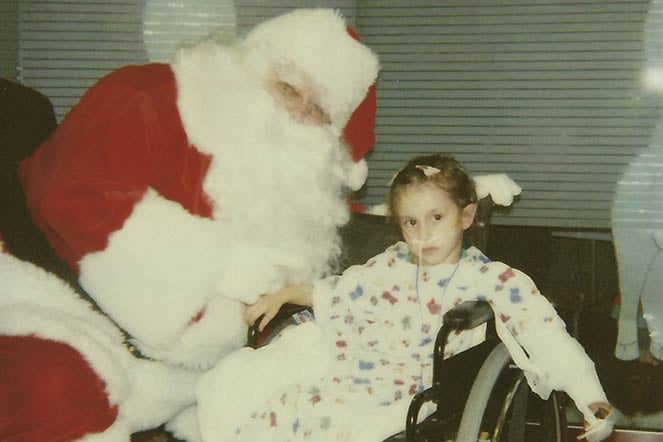 Santa visits young burn patient in wheelchair