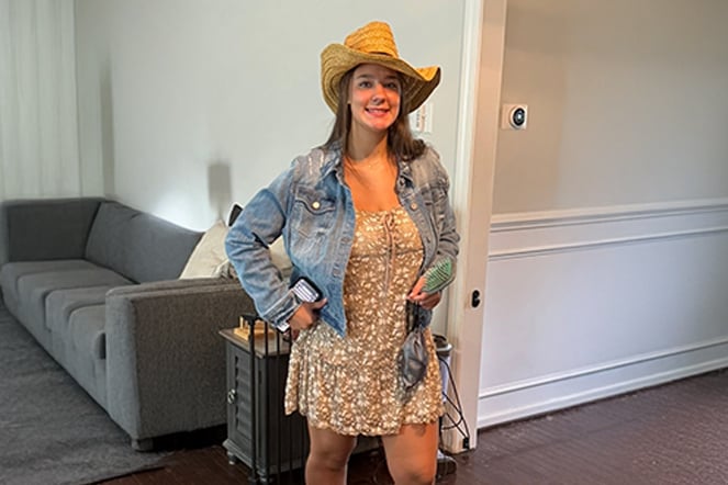 a teen in a country western outfit