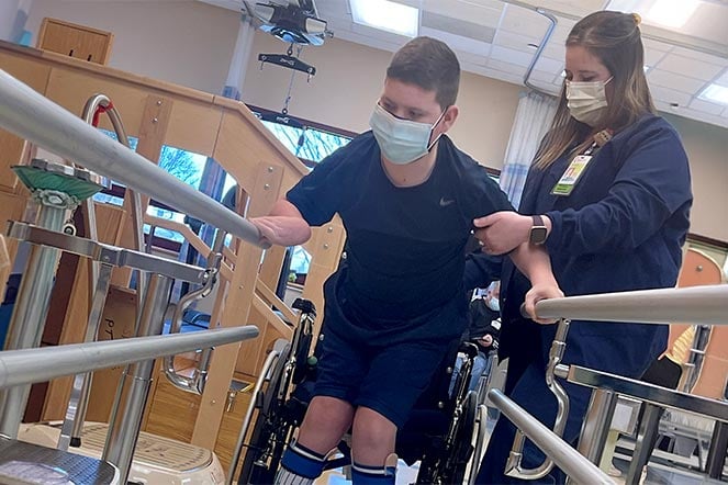 patient and therapist during physical therapy session