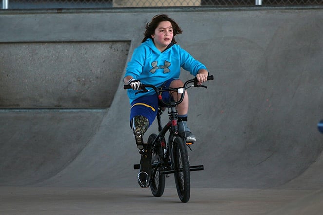 Adison riding her bike